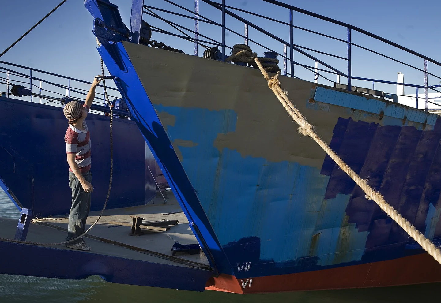 Protective marine coating on a steel ship hull