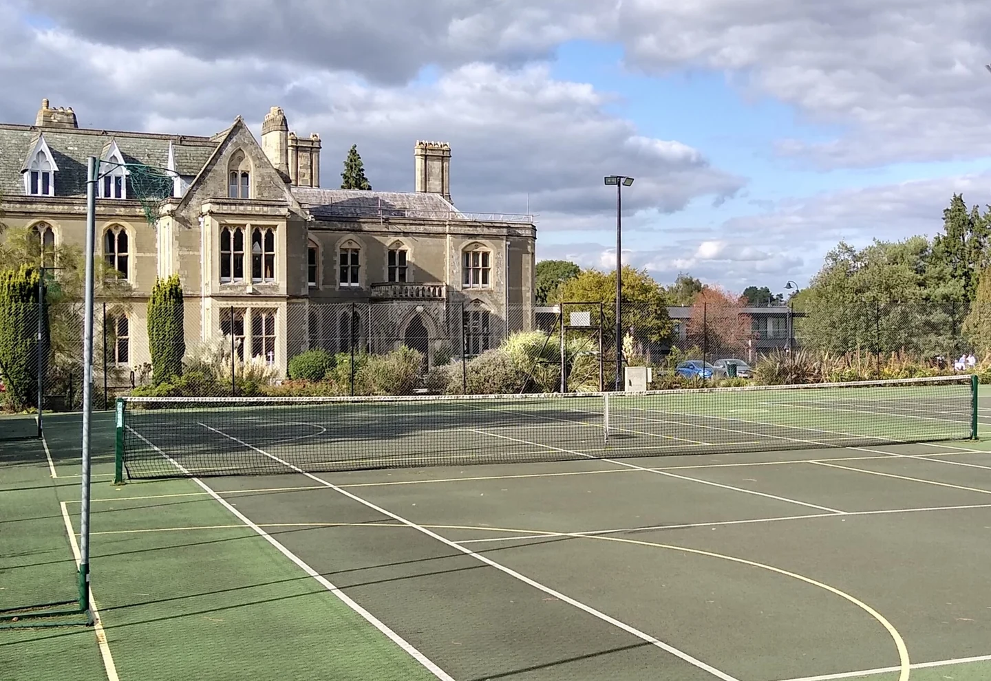 Colored sports-court coating